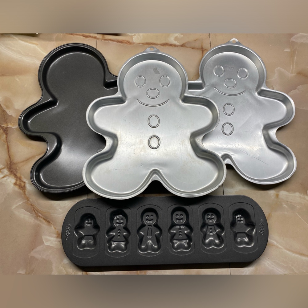 4pc Collection of Wilton Gingerbread person cake/cookie pans